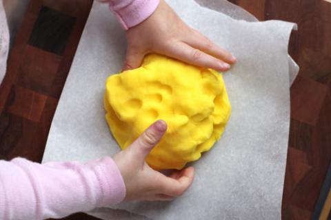 Child Playing with Play Dough