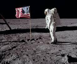 man on the moon with American flag